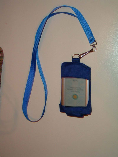 Player in a bright blue case with a long strap