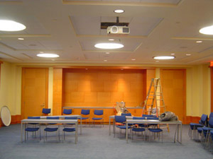 Fig 14: The lecture room's integrity was threatened by the need to accommodate a waning medium. Architects hoped to minimize the impact of a window in the back wall